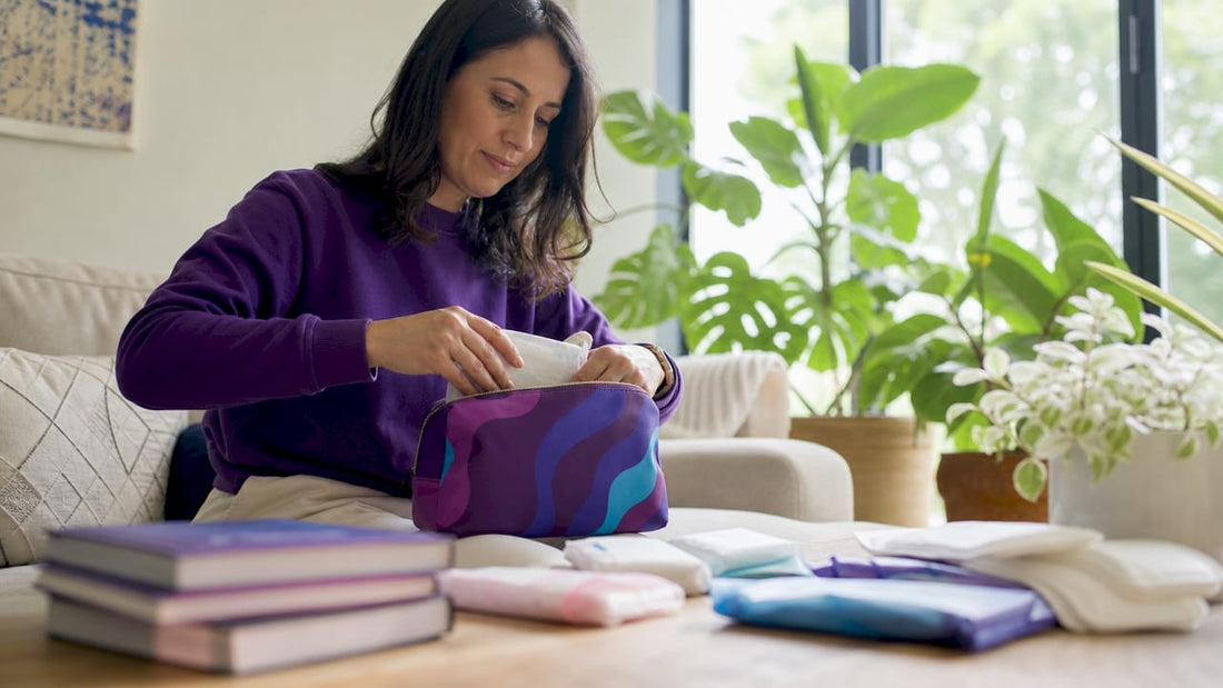 Mother assembling a period kit for daughter